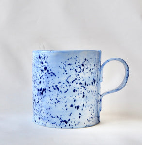 Blue porcelain mug with splatter detail