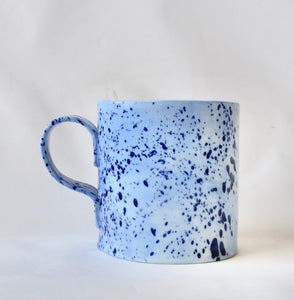 Blue porcelain mug with splatter detail