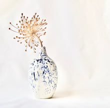 White porcelain vase with splatter detail