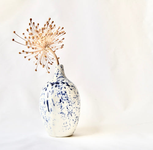 White porcelain vase with splatter detail
