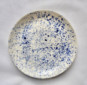 White medium porcelain plate with splatter detail