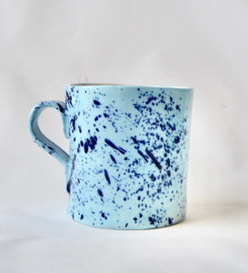 Blue azure porcelain mug with splatter detail