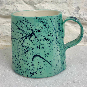 Sea green porcelain mug with splatter detail