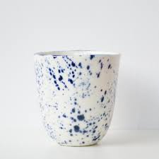 White porcelain handleless mug with splatter detail